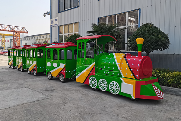 Where Should Trackless Train Stops Be Located Inside a Large Shopping Mall?